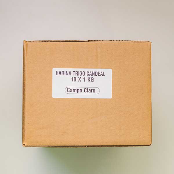 Caja con paquetes de harina integral candeal 10x1kg